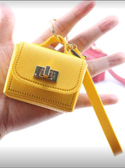 Shein 1pc Plain Casual Elegant PU Leather Key Chain, Rotatable Lock Design, Mini Bag Decor ---